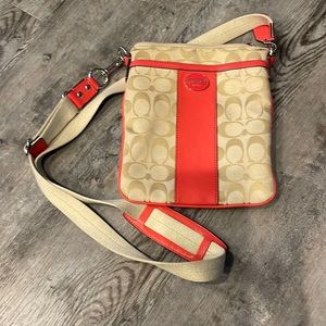 Coach signature crossbody with coral accents